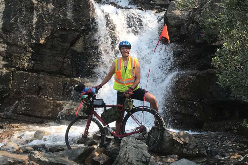 Bears, fire no deterrent to priest's charity ride