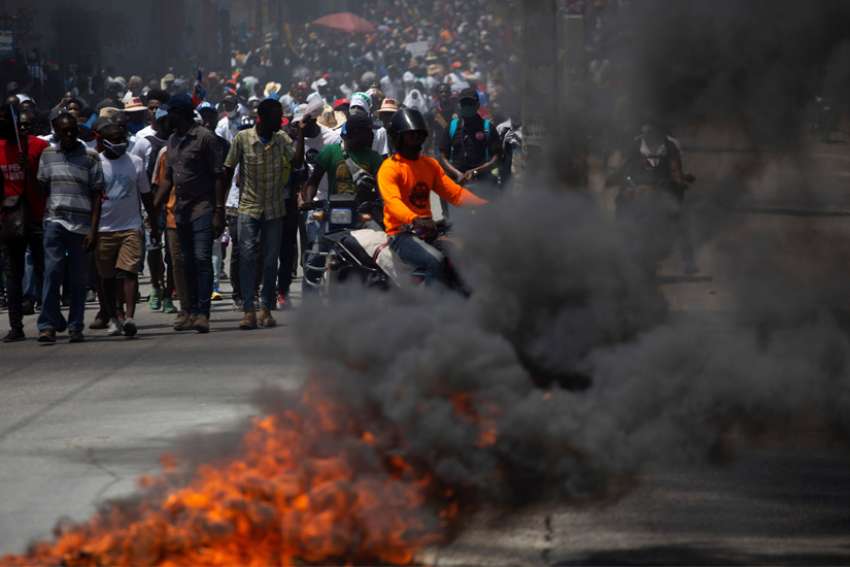 Police fire tear gas into Haitian bishops' Mass for freedom