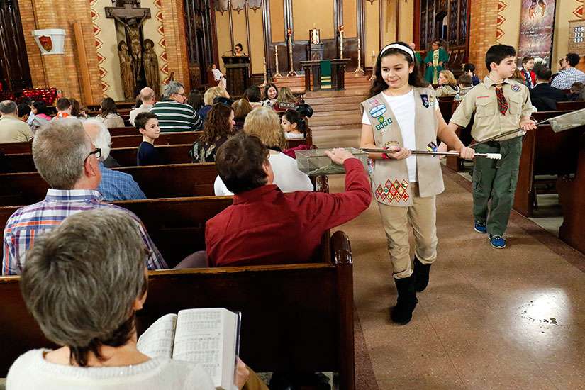 St. Louis archbishop pushes for switch to Girl Scout alternatives