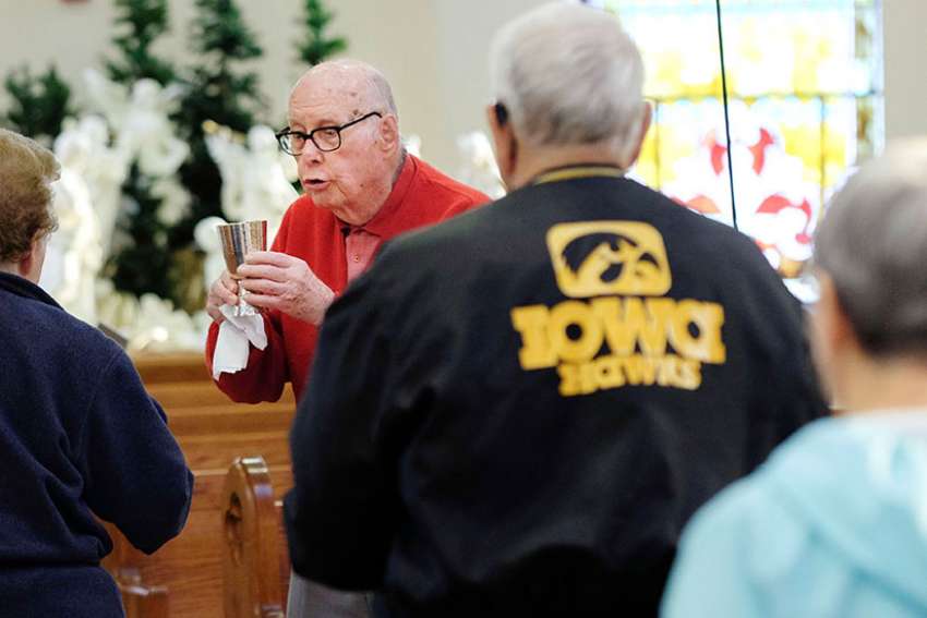 Iowan man to celebrate two milestones: turning 97, 91st year as altar 'boy'
