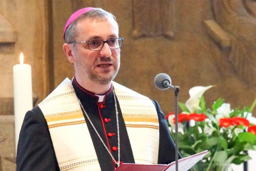 Amid cover-up allegations, German prelate steps down from lay organization