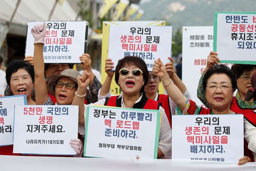 South Korean Catholics rally against nuclear power, U.S. missile system