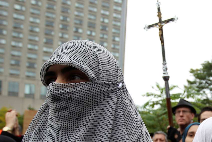 Churches want changes to anti-niqab law