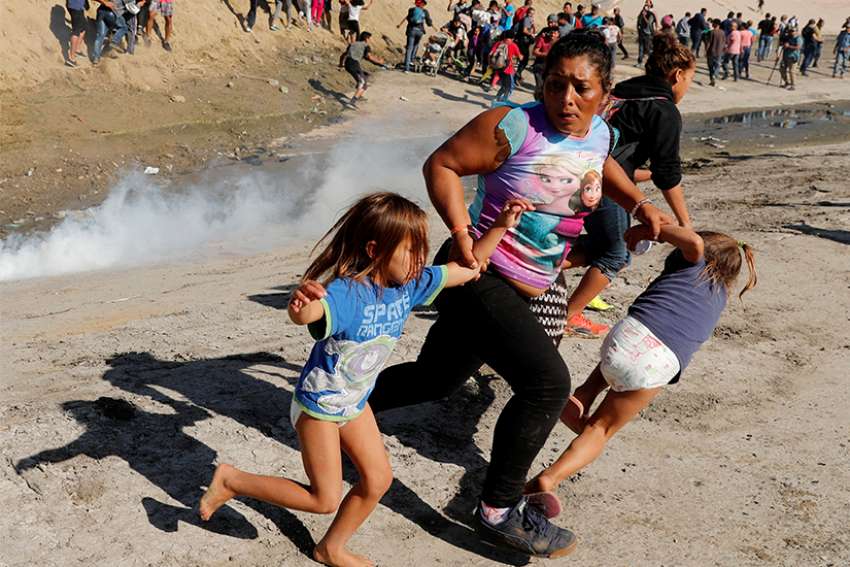 Catholic migrant advocates have mixed reaction to chaotic Tijuana border crossing
