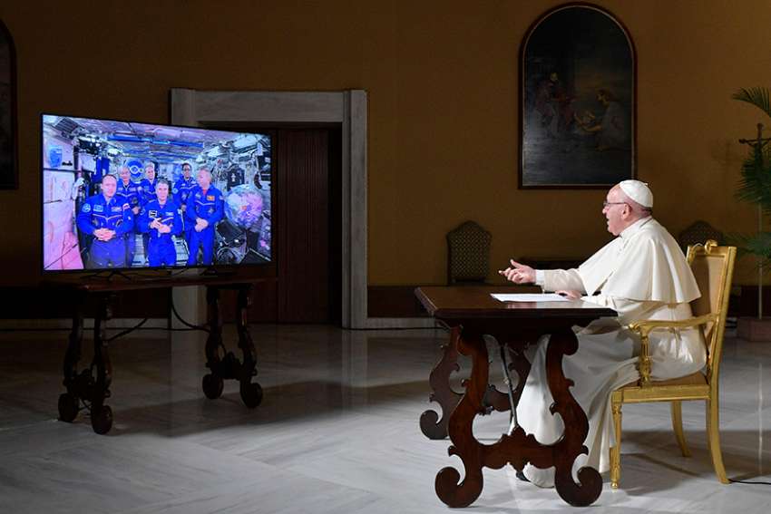 Pope says space station crew like a 'tiny U.N.'