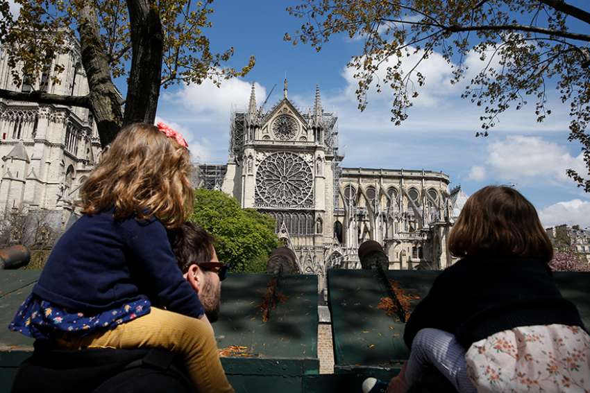 The French in Canada find meaning of faith in cathedral blaze