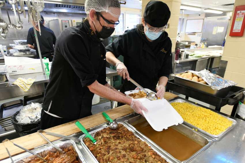 Good Shepherd goes takeout again for annual Christmas feast