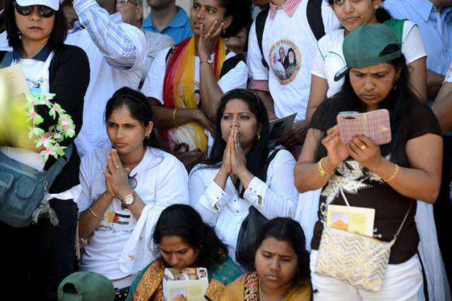 ‘One God, one world, one people’