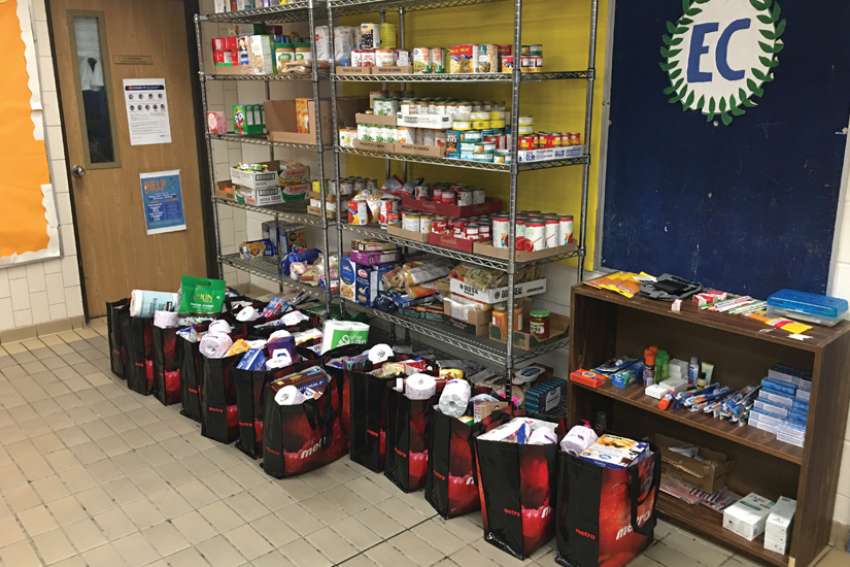 School partners unite to fill the pantry shelves for those in need