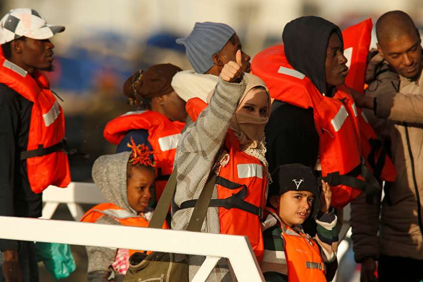 After drawn-out negotiations, Malta lets rescued migrants disembark