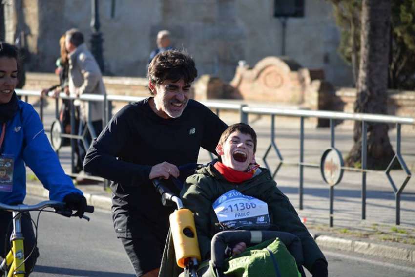 The story of a father who runs marathons with his disabled son