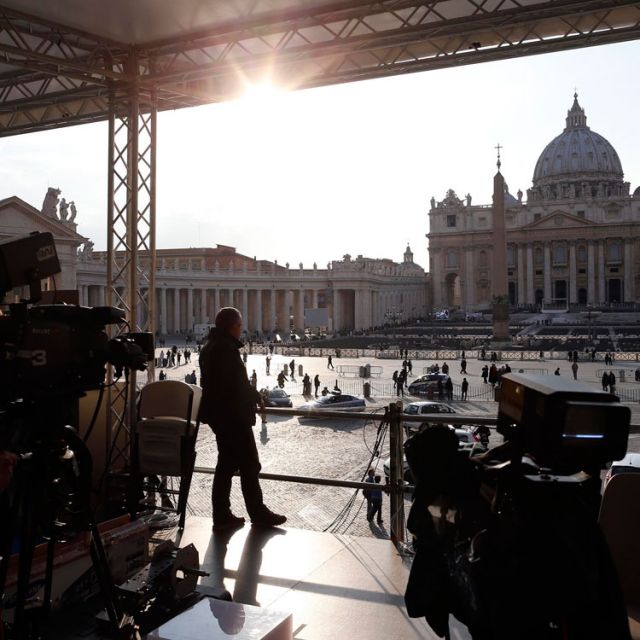 Tourists, locals stake out spot where cardinals gather for meetings