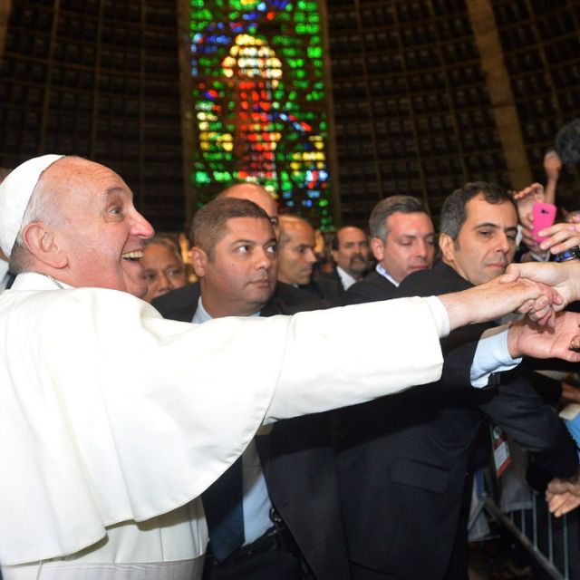 Argentines flock to Rio cathedral to see their cardinal-turned-Pope 