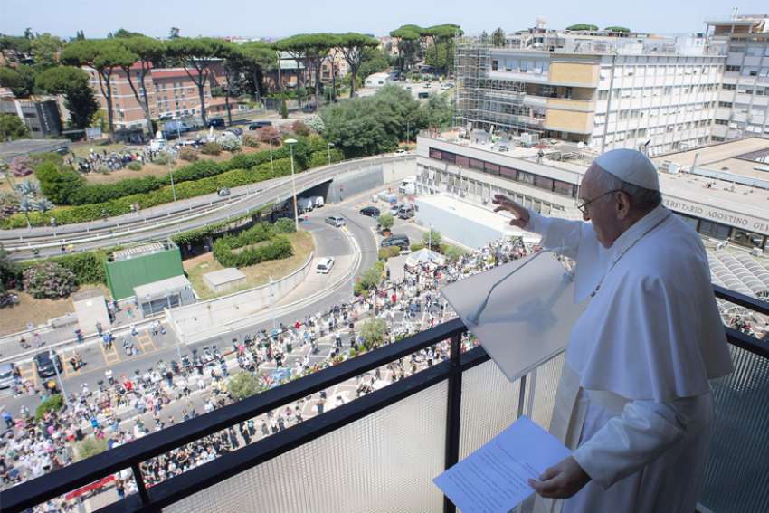 Hundreds gather outside hospital to greet Pope Francis as he recovers