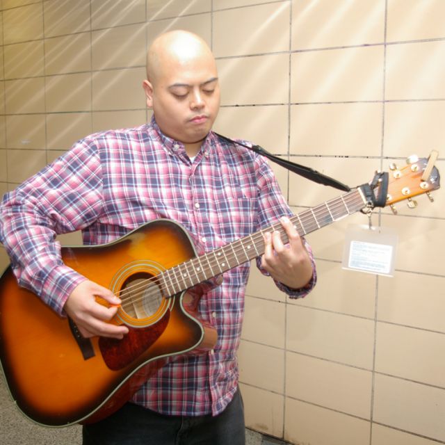 Subway busker spreads God’s love through song [w/ video]