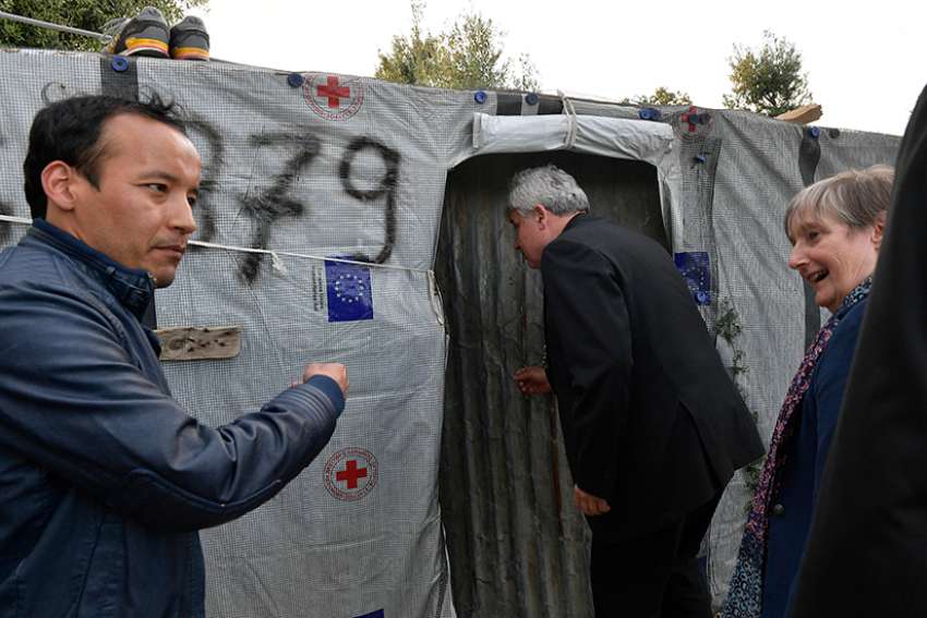 Pope sends cardinal to Lesbos as refugees continue to arrive