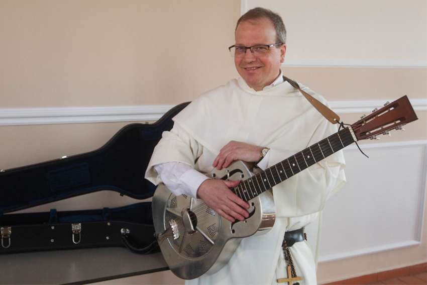 Picker priest explains bluegrass appeal