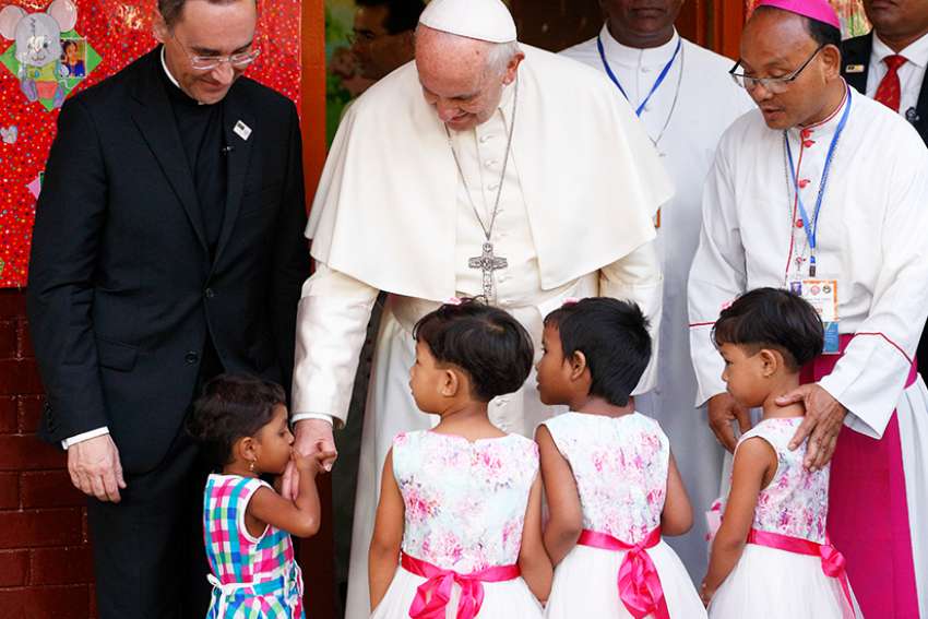 Pope calls for respect as he listens to Rohingya refugees