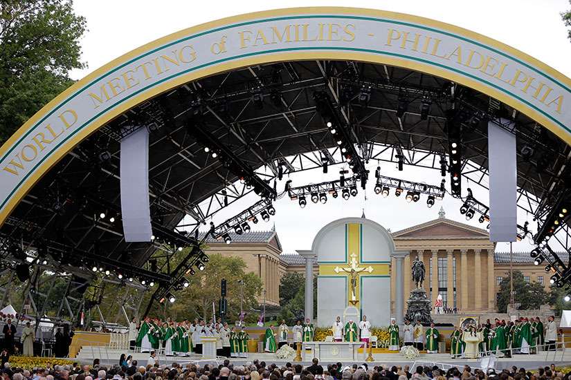 Serve, care for each other, Pope tells families at closing Mass