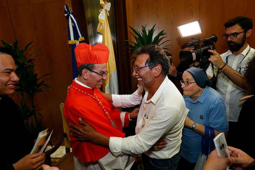 Fresh from consistory, new cardinals greet family, friends