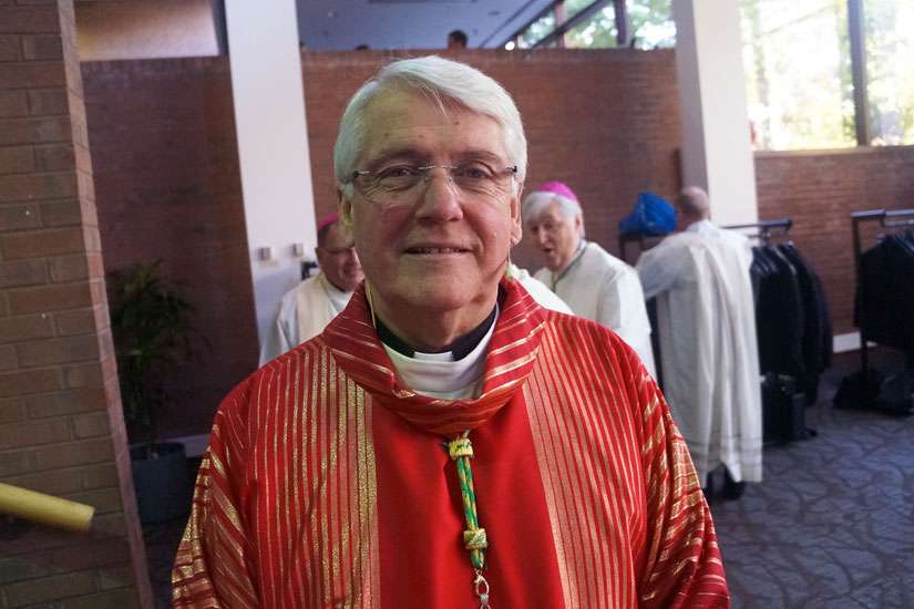 Act now to process refugees, Bishop Crosby tells minister
