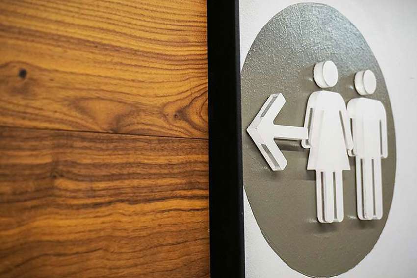 Trump drops Obama administration's transgender bathroom fight