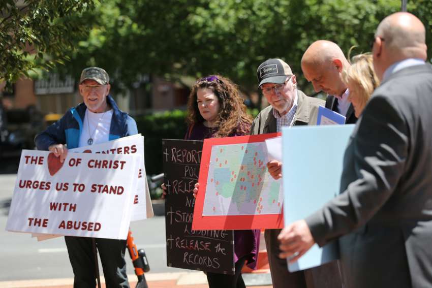 Group protests outside Baltimore hotel, objects to proposals on abuse
