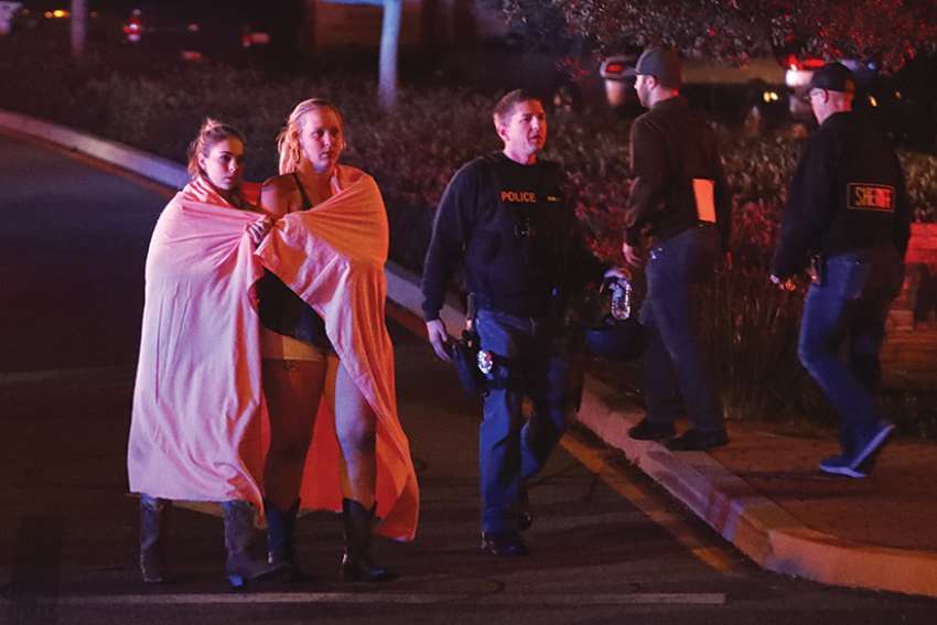 'Pray hard' for all affected by California shooting, Archbishop Gomez says