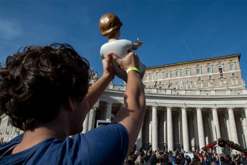 Pope Francis blesses infant Jesus statues at Angelus audience