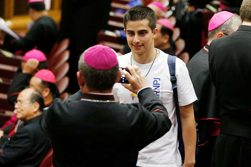 Listen to young people, make 'courageous choices' to renew church, cardinal tells synod