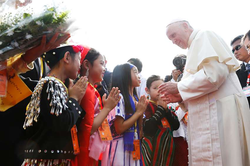 Pope Francis welcomed by children, meets generals in Myanmar