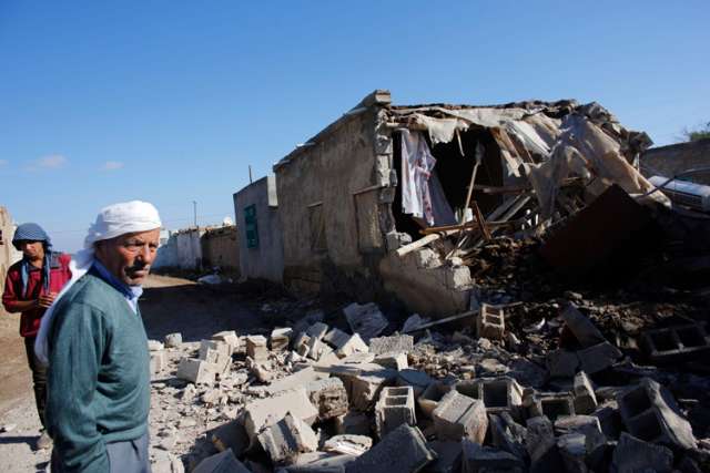 Syrian priest says church carries on its ministry to people amid strife