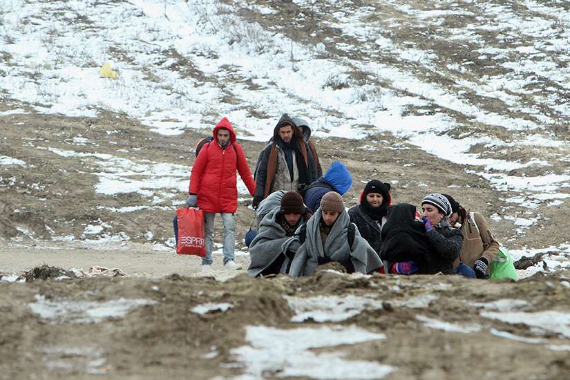 German churches tone down refugee welcome as problems mount