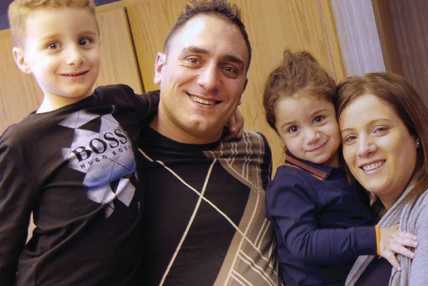 Parents credit St. Charbel for saving the life of their baby