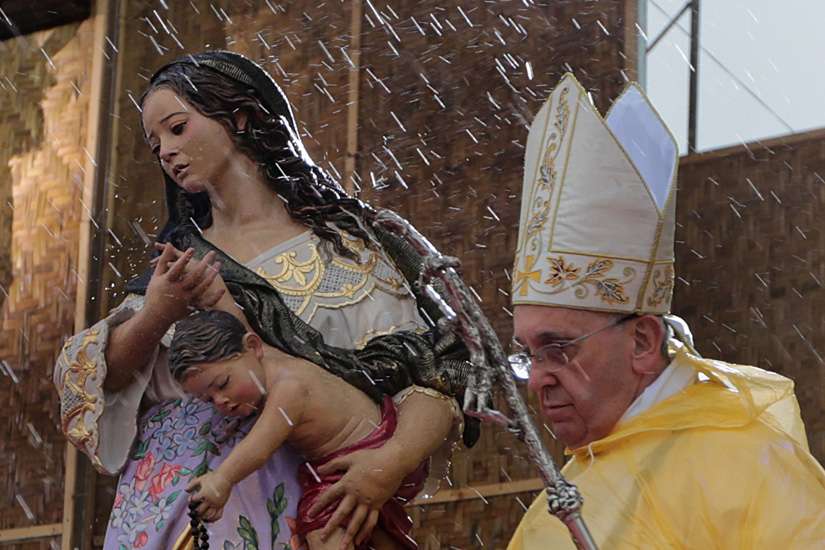 Typhoon survivors grateful Pope braved tropical storm for Mass