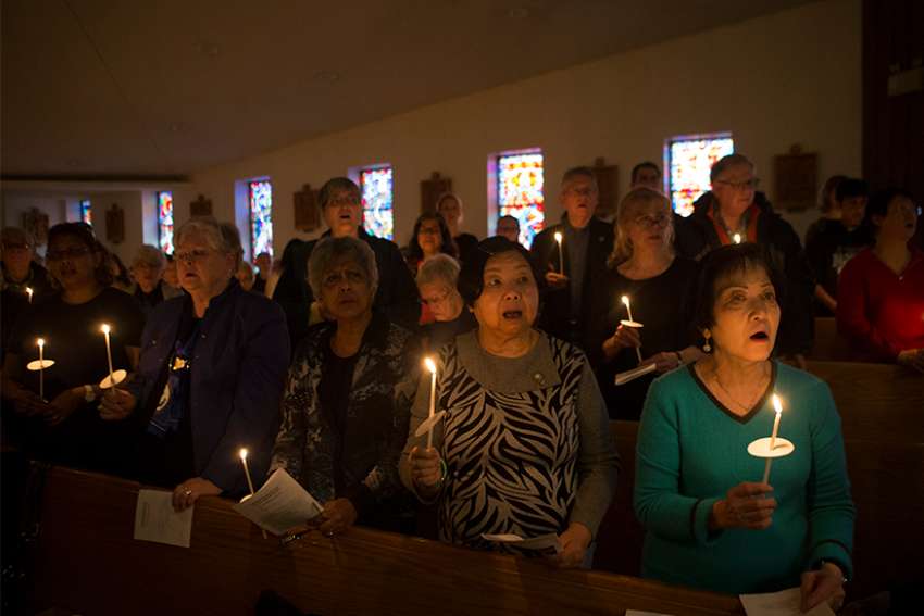 Overflow crowd mourns victims at interfaith prayer service