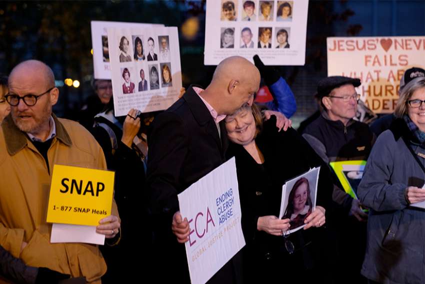Catholics protest outside U.S. bishops' meeting in Baltimore, call for change