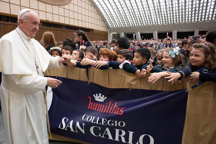 Pope urges students to see human actions behind suffering, war