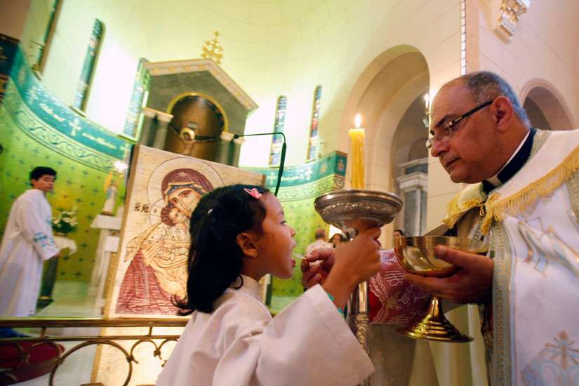 San Francisco priest bars altar girls, sparks another controversy
