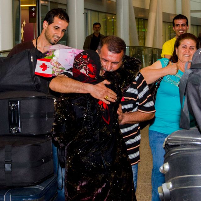 Iraqi family sponsored by Cardinal Collins reunites in Toronto