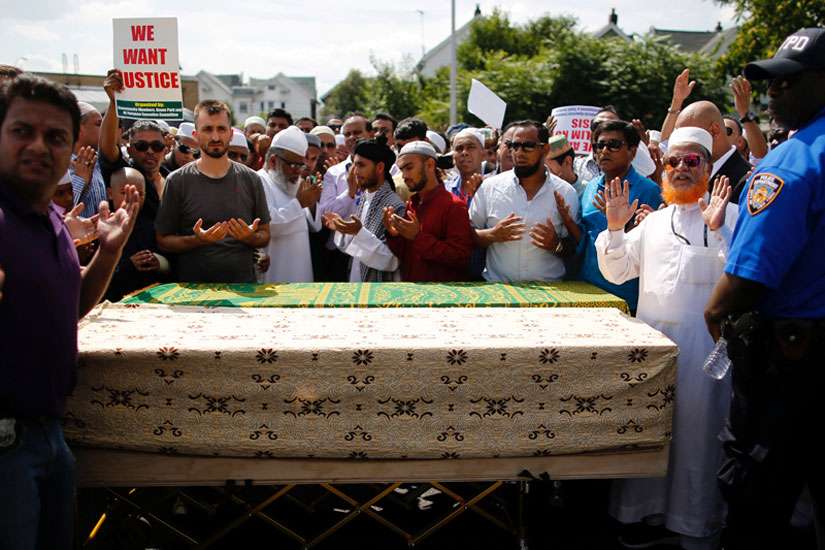 Police, Muslims seek answers after cleric and associate killed in Queens