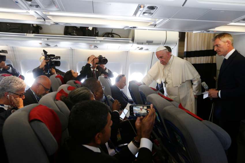 Pope Francis tells reporters to keep to 'the facts'