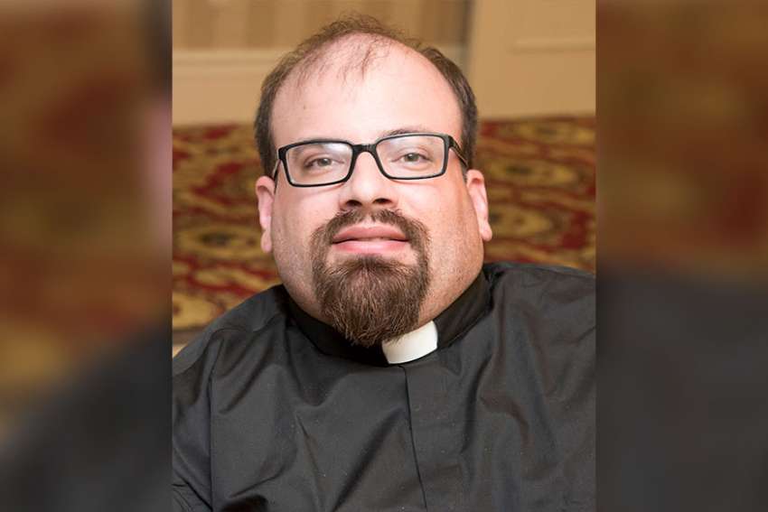 Priest who had spina bifida dies while on holiday