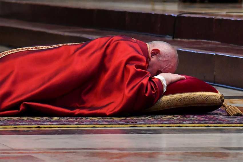 Cardinal, at Pope Francis' Good Friday service, decries divisions within church