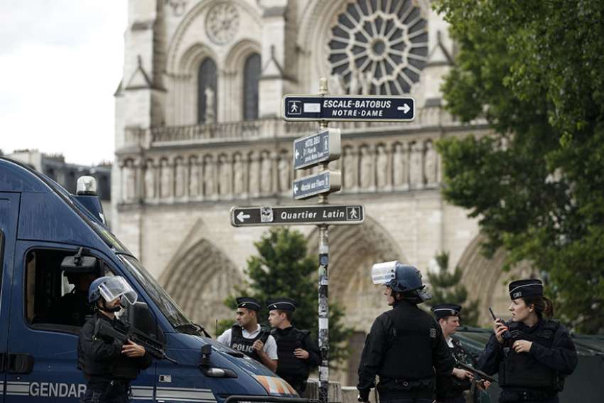 Attack on police near Notre Dame cathedral shakes Paris