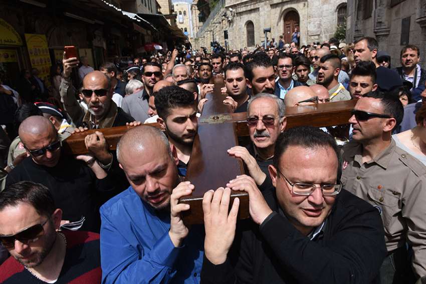 Family tradition: Carrying the cross on Jerusalem's Via Dolorosa