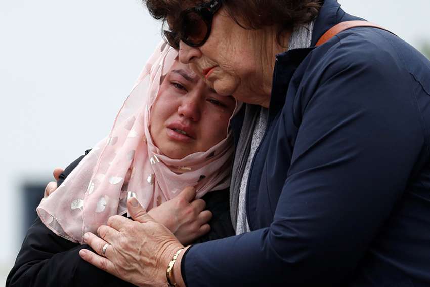 'Our only hope is in God': New Zealanders gather to pray after mosque shooting