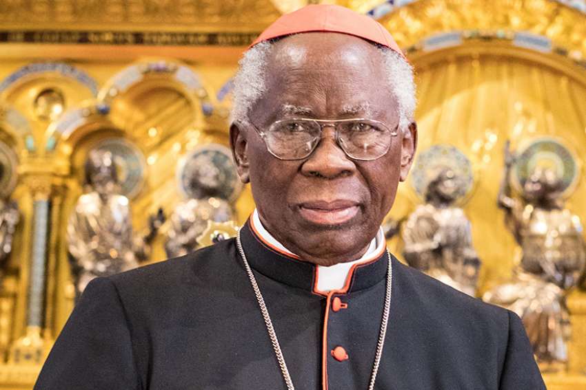 Communion cannot be shared with friends like beer or cake, Cardinal Arinze says
