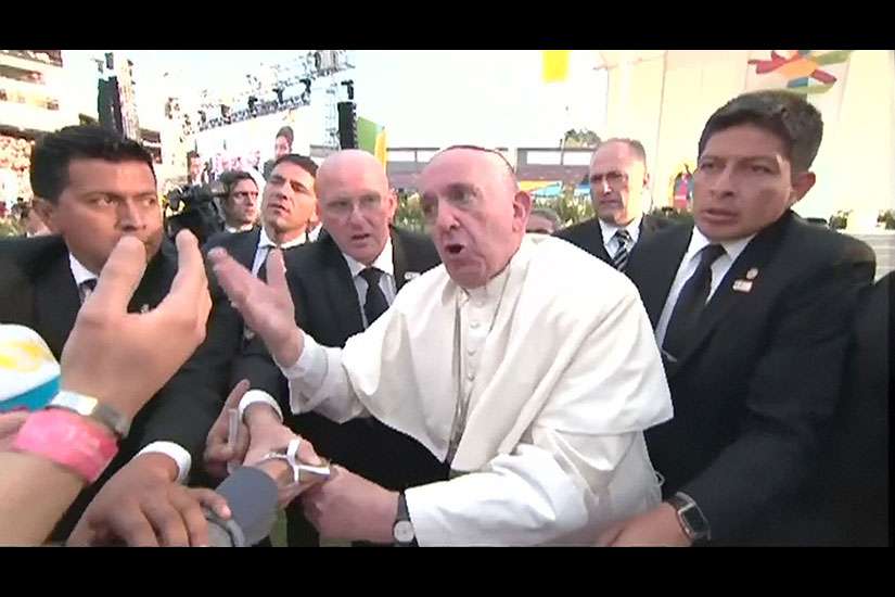 Pope snaps at pilgrim who caused him to fall into boy in wheelchair