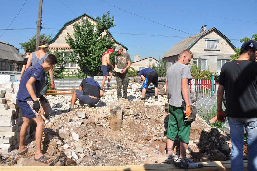Restoring walls, rebuilding communities: Ukrainians help one another